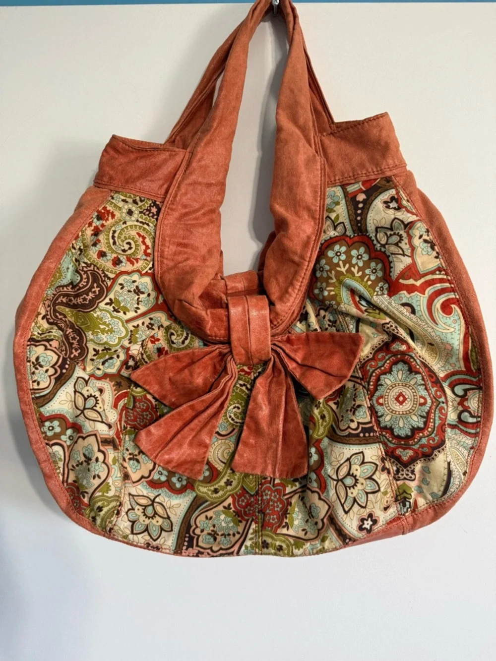 Ebisu Boho Paisley Print Hobo Bag with Large Bow Accent Orange Coral